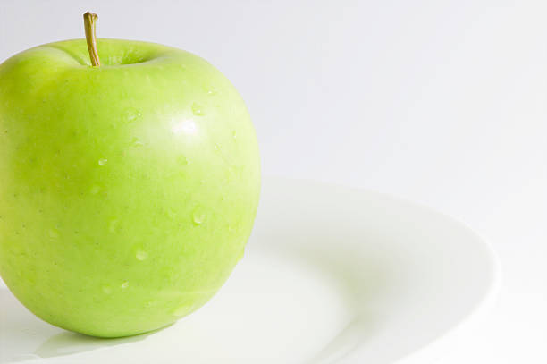 Green apple with copy-space stock photo