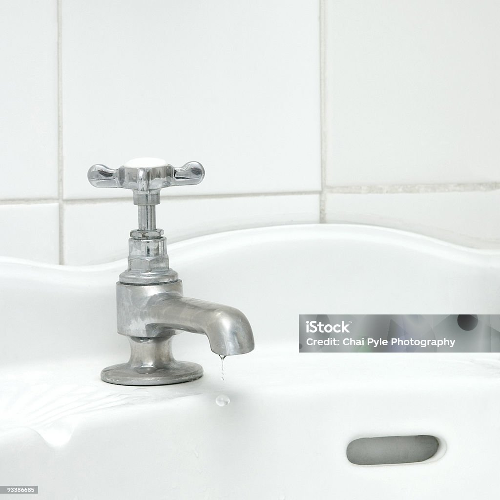 Dripping tap  Bathroom Sink Stock Photo