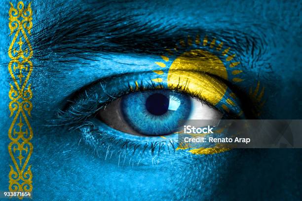 Human Face Painted With Flag Of Kazakhstan Stock Photo - Download Image Now - Cultures, Kazakhstan, 20-29 Years