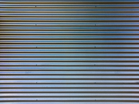 Corrugated metal sheet as a background