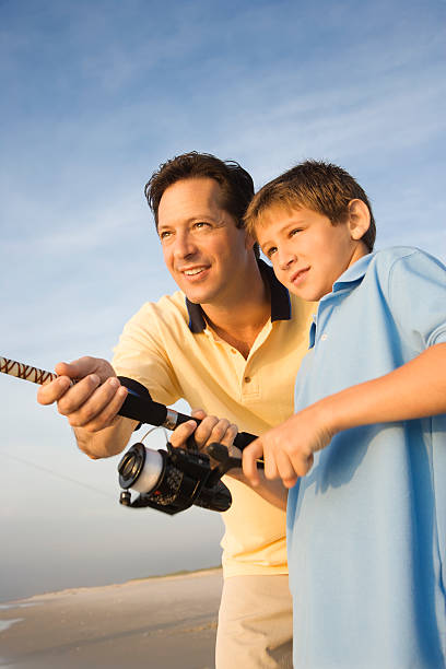 istock Father and son fishing 93388284