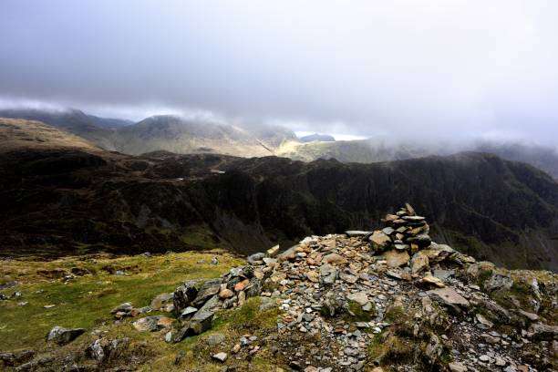istock Pile of stone on the summit of Fleethwith Pike 933883258