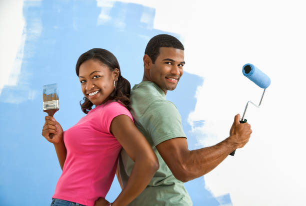 istock Man and woman ready to paint. 93388641