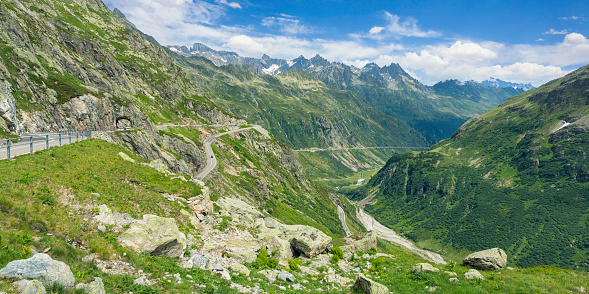 A serpentine road through the mountains and valleys of Susten Pass in Switzerland.