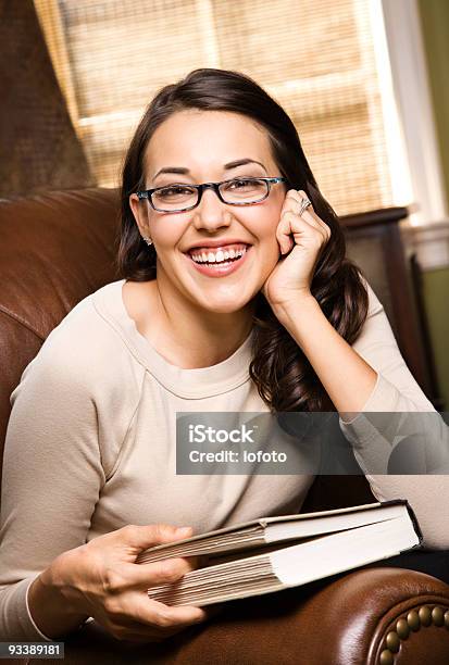 Smiling Woman Holding A Book Stock Photo - Download Image Now - 20-24 Years, 20-29 Years, Adult