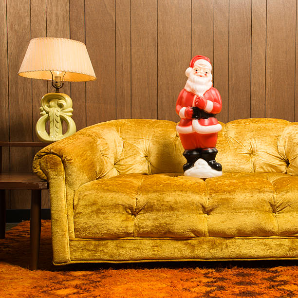 Santa figurine on couch. stock photo