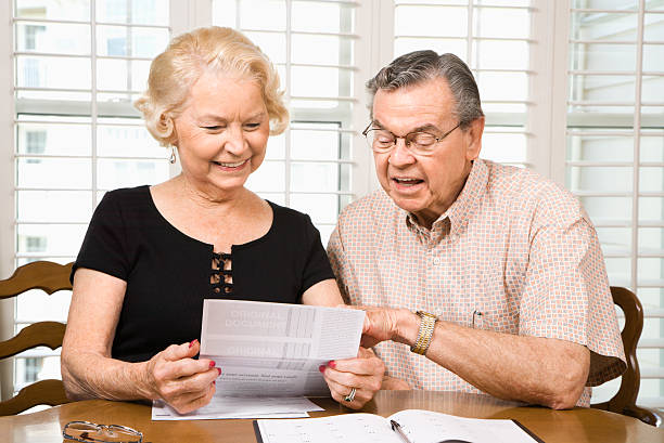 istock Mature couple with bills. 93389587