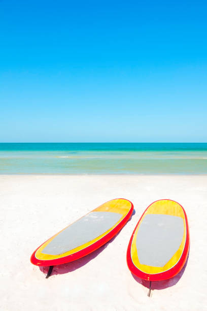 istock Surfboards on sand in exotic tropical caribbean beach 933901490