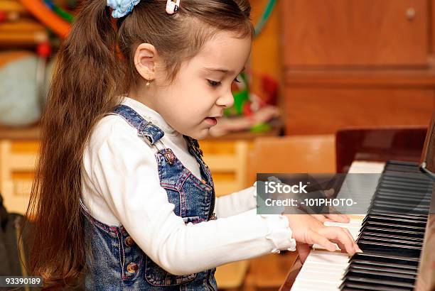 Girl Plays Piano Stock Photo - Download Image Now - Education Training Class, Theatrical Performance, Toddler