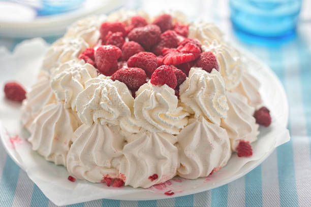 istock Pavlova with cream and raspberries 933904026