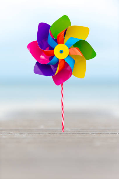 istock Pinwheel toy in different colors - whizz wheel 933909150