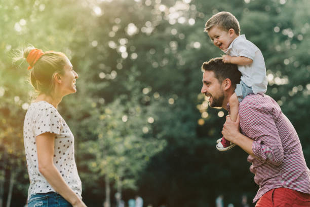 istock Happy family in the park 933909360