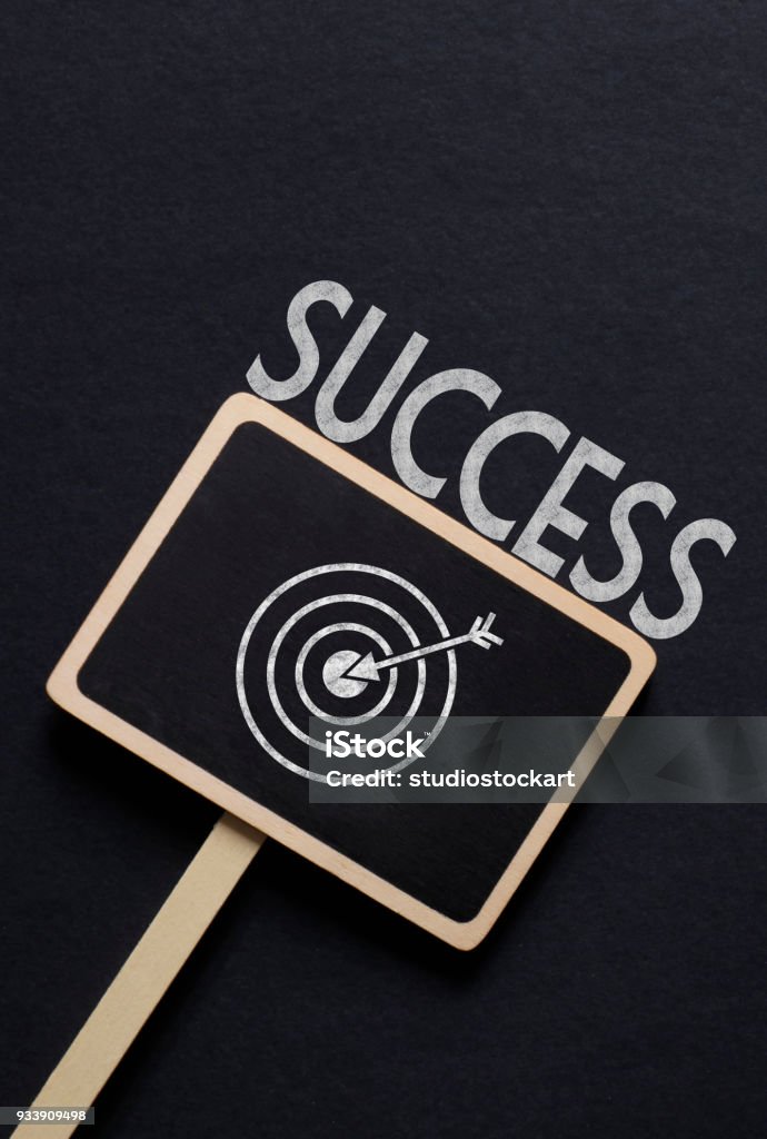 Success Small blackboard on the black background Abstract Stock Photo
