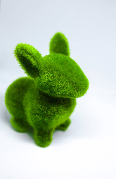 istock Easter green rabbit made by the grass 933911790