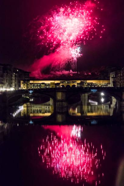 istock Fireworks by the historic Ponte Vecchio bridge in Florence 933919714