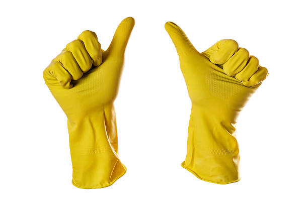 ok signe jaune, de gants en caoutchouc - sterilely photos et images de collection