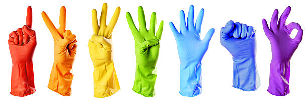 gants de caoutchouc de couleur raibow - sterilely photos et images de collection