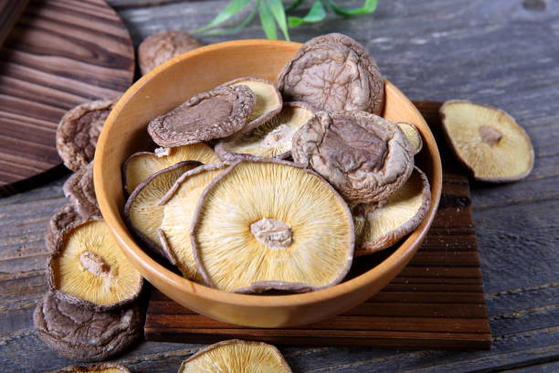 istock Shiitake Mushroom On Wooden Table 933929610