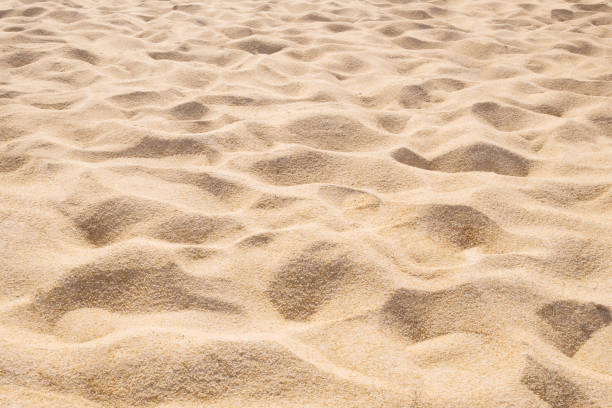 beautiful sand beach pattern background. brown sandy texture - sandy brown fotos imagens e fotografias de stock