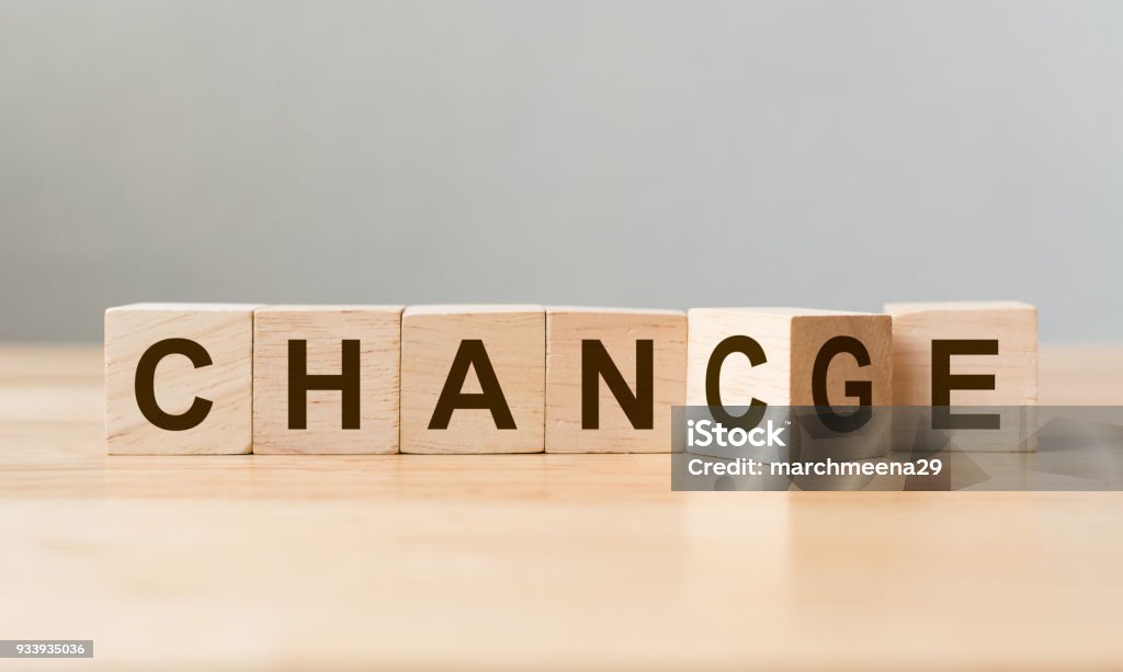 Wooden cube flip with word "change" to "chance" on wood table, Personal development and career growth or change yourself concept Change Stock Photo