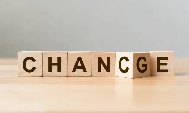 Photo of Wooden cube flip with word 