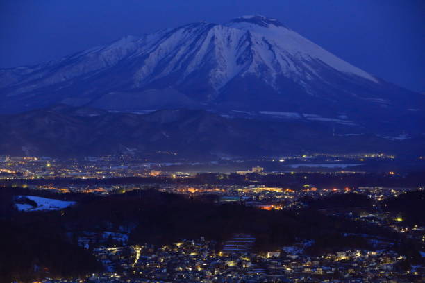 istock Iwate volcano and at night 933935170