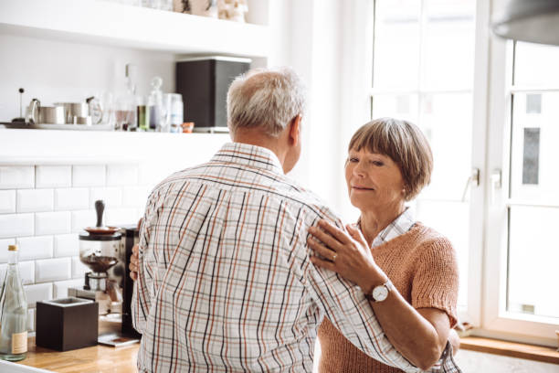 istock senior adult dancing in the kitchen 933935218
