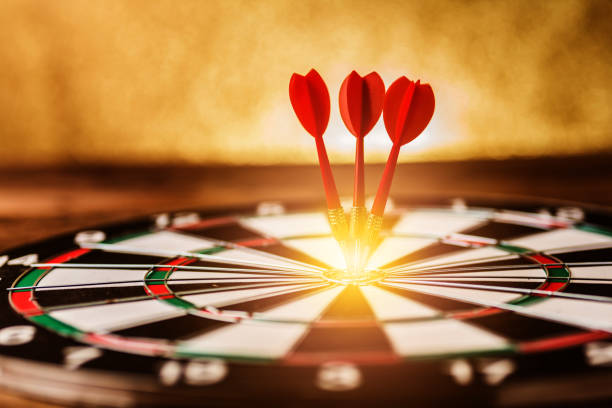 istock red three darts arrows in the target center 933939918