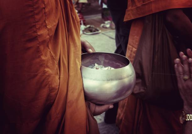 istock Monks receive food from people. 933962546