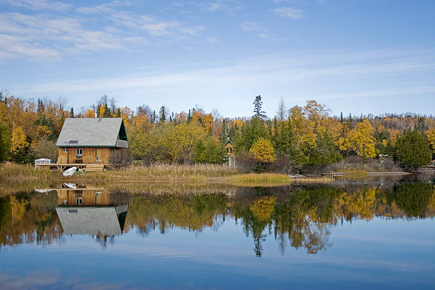 Reflections Of A Fall Time Cabin stock photo