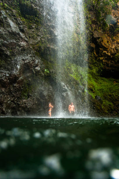 istock Father and daugther waterfall adventure in Hawaii 934000802