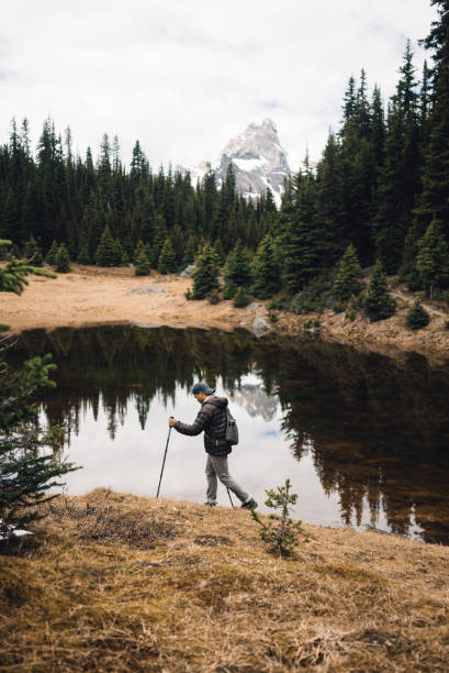 istock A man hikes by a lake in the forest 934025020
