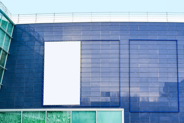 istock Street layout, empty Billboard on the wall of a modern glass building 934041080