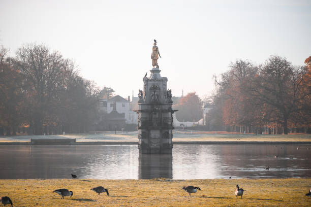 istock Early morning autumn scene at bushy park 934048348