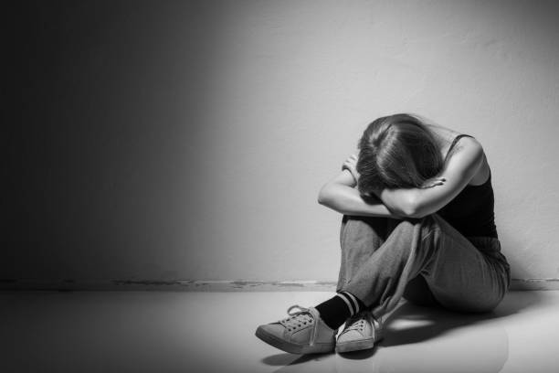 istock Depressed woman on the floor 934048620