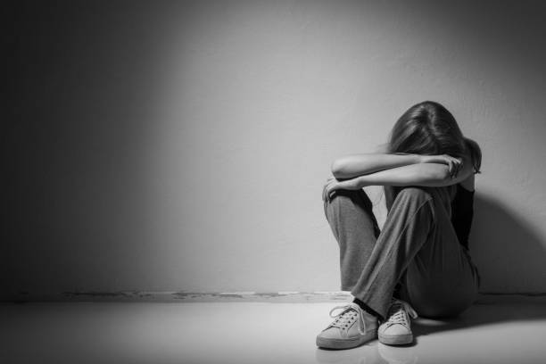 istock Depressed woman on the floor 934050678