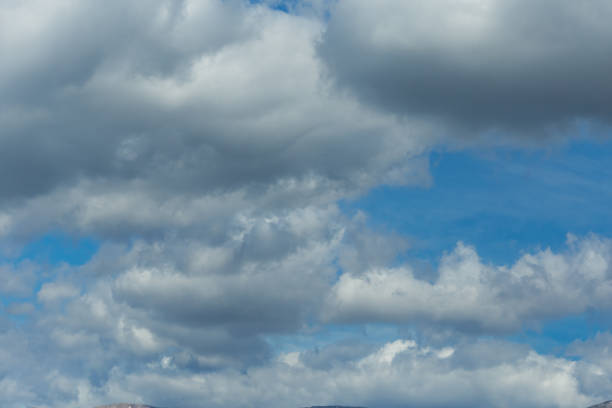 istock mountain peak snow clouds blue sky, epirus Ioannina Greece Mitsikeli peak mountain 934064036