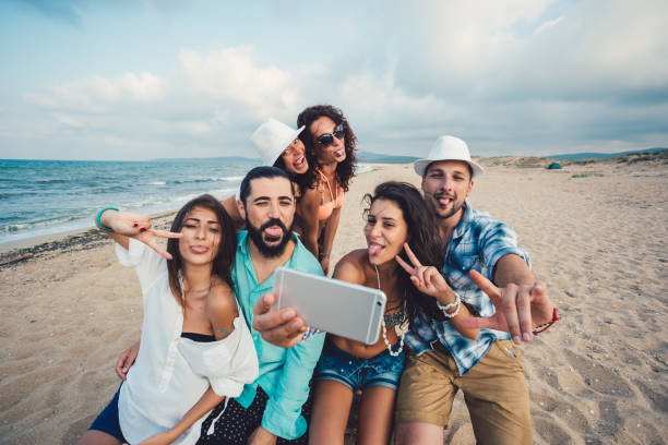 istock Friends taking selfie at the seaside 934083724