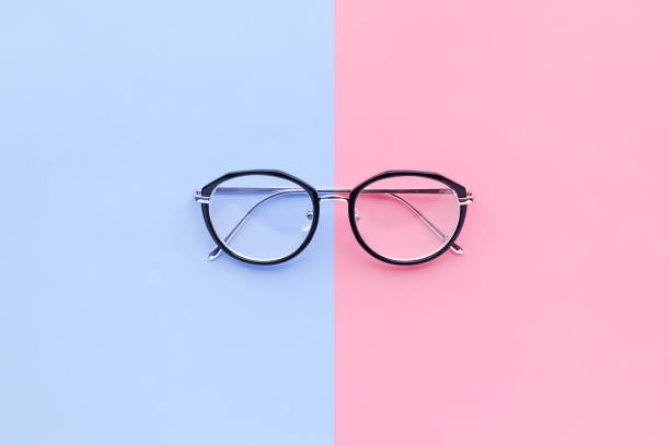istock Glasses on two color pastel background.holiday concept 934089378