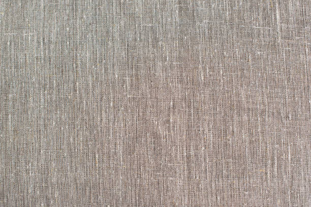 istock Texture canvas fabric background in light brown beige color. 934089450