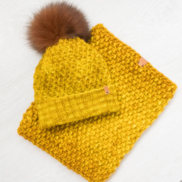 istock knit winter hat, scarf and nittens 934092372