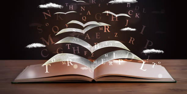istock Pages and glowing letters flying out of a book 934095626