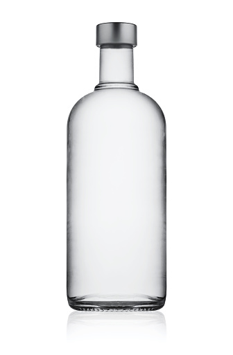 Full closed bottle of vodka isolated on white background