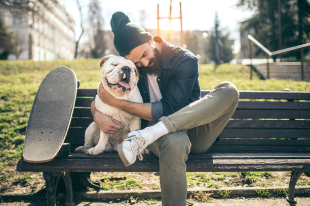 istock Man and dog in the park 934108066