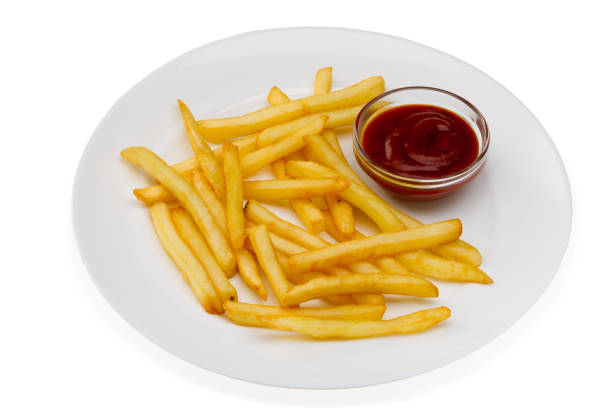 istock French fries with red sauce on a white plate 934108554