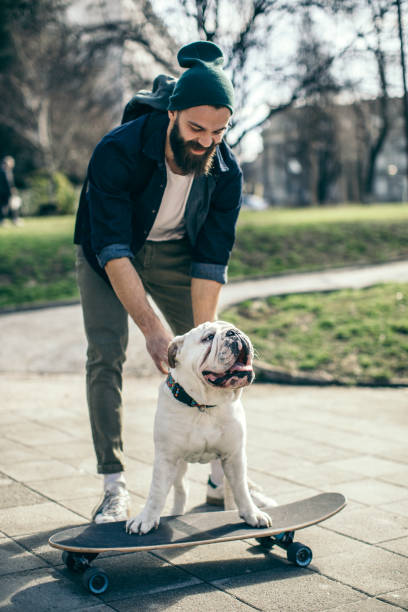 istock Man and dog in the park 934108620