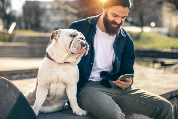 istock Man and dog in the park 934108782