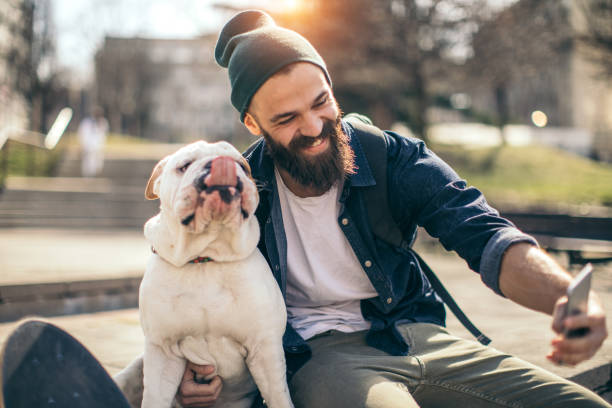 istock Man and dog in the park 934110900
