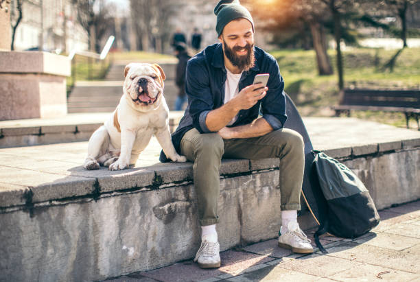 istock Man and dog in the park 934110902