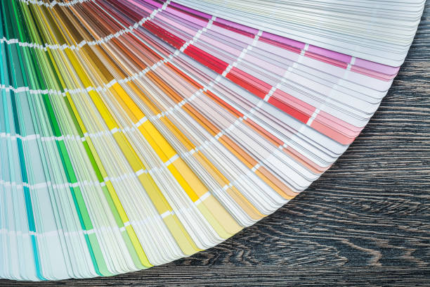 istock Color pantone fan on wooden board top view 934111094